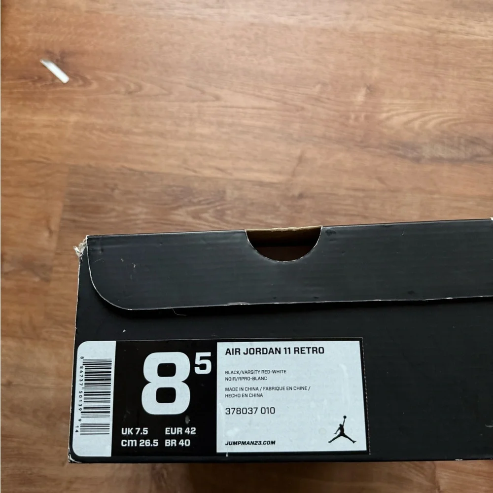Air Jordan 11 Bred Black and Red High-Top Basketball Sneakers